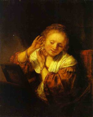 Oil rembrandt Painting - A Young Woman Trying on Earings. 1657 by Rembrandt